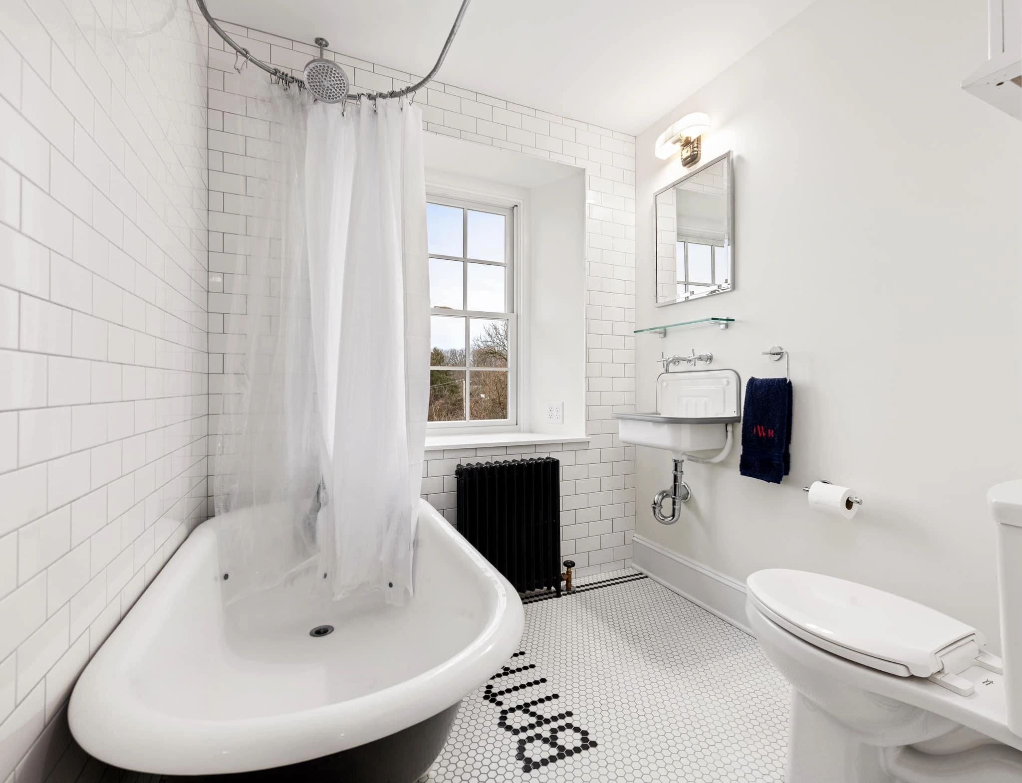 MCS Custom Tile — bathroom with hex floor tile